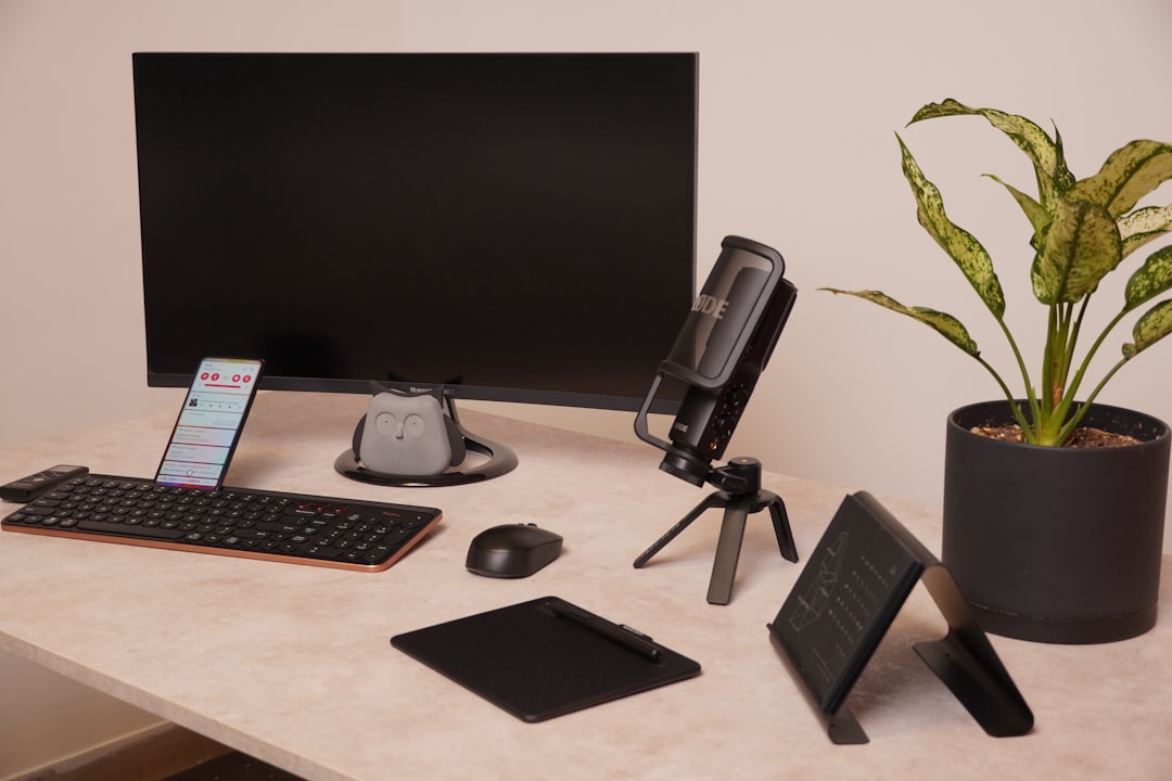 A stressed professional at a desk, illustrating workplace pressure.